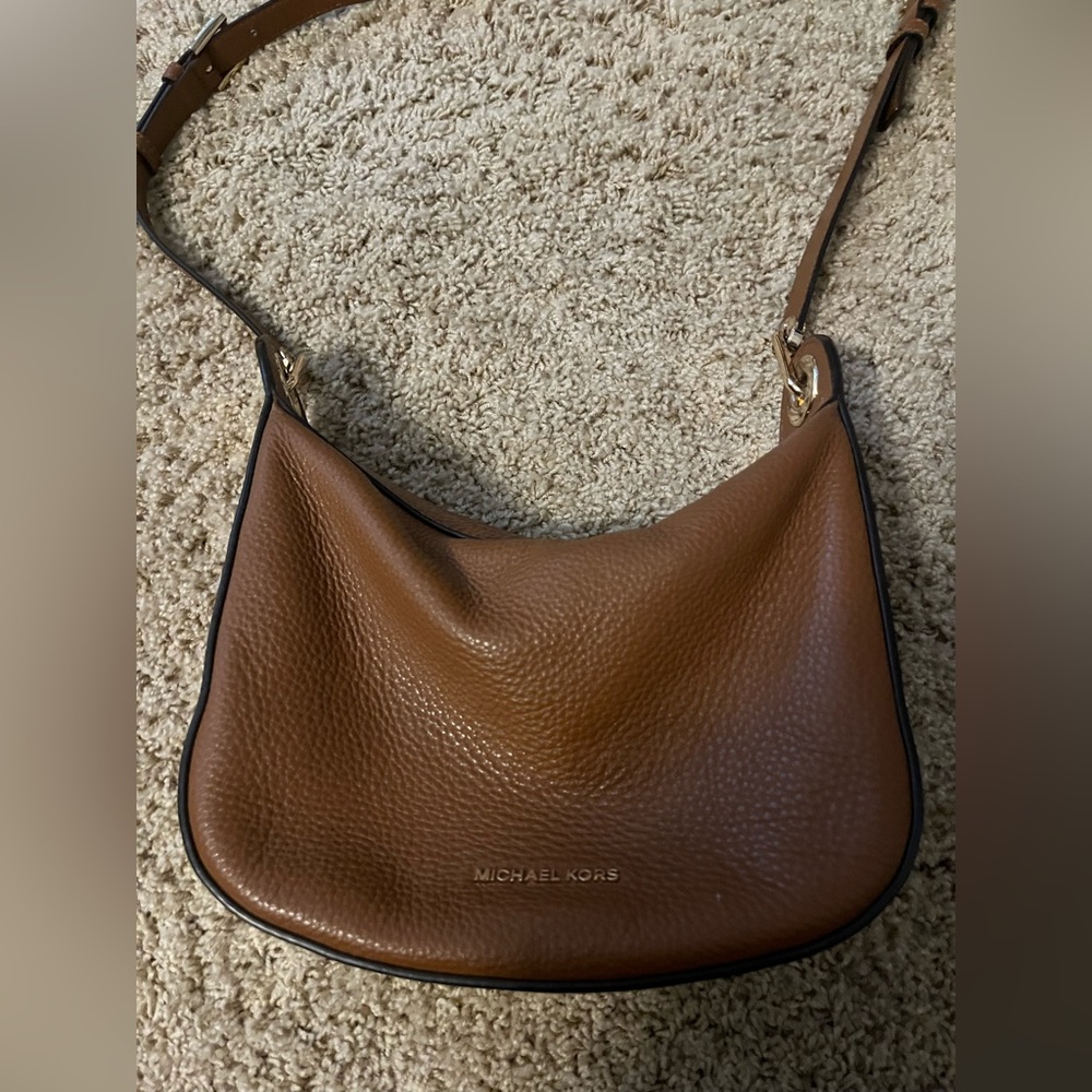 Michael Kors Purse! Little spots on the outside from light use.